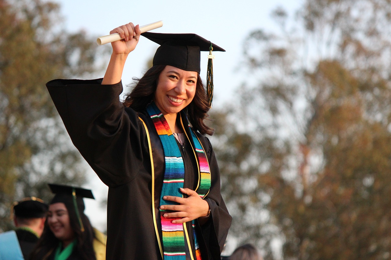 An image showing a female graduate