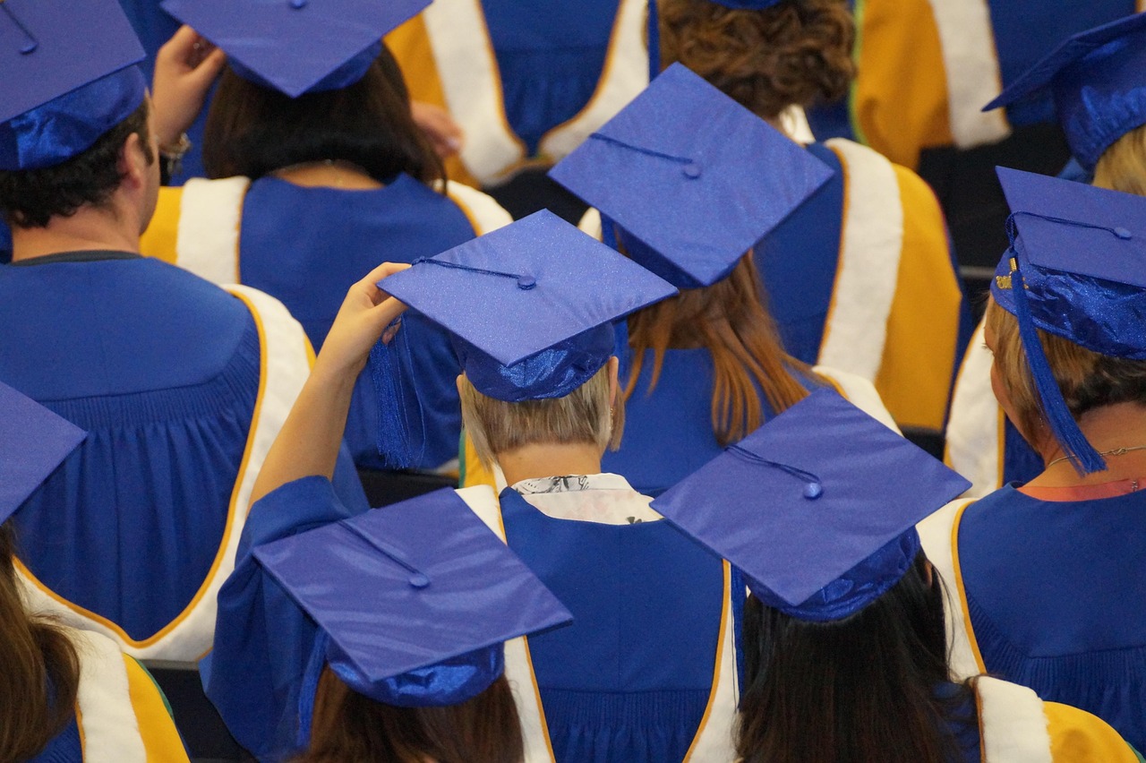An image showing graduates standing in line